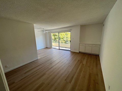 Living Room with Hard Floors and Bar