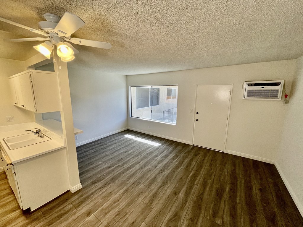 Dining Room with Hardwood Floors and Fan