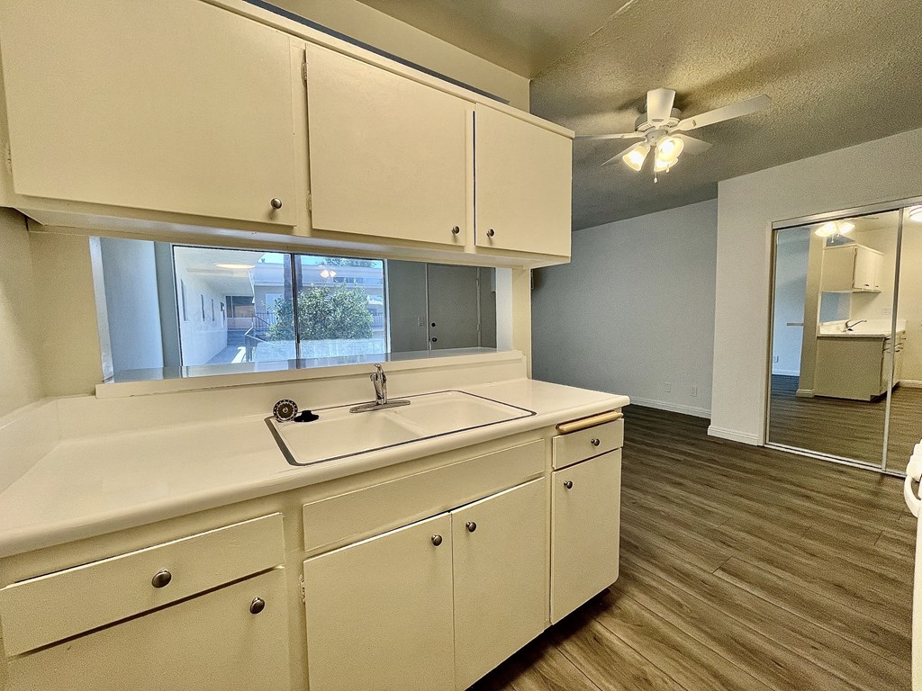 Kitchen with White Appliances and White Cabinets