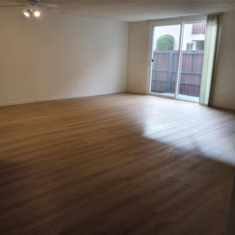 Living Room with Hardwood Floors and Patio Door