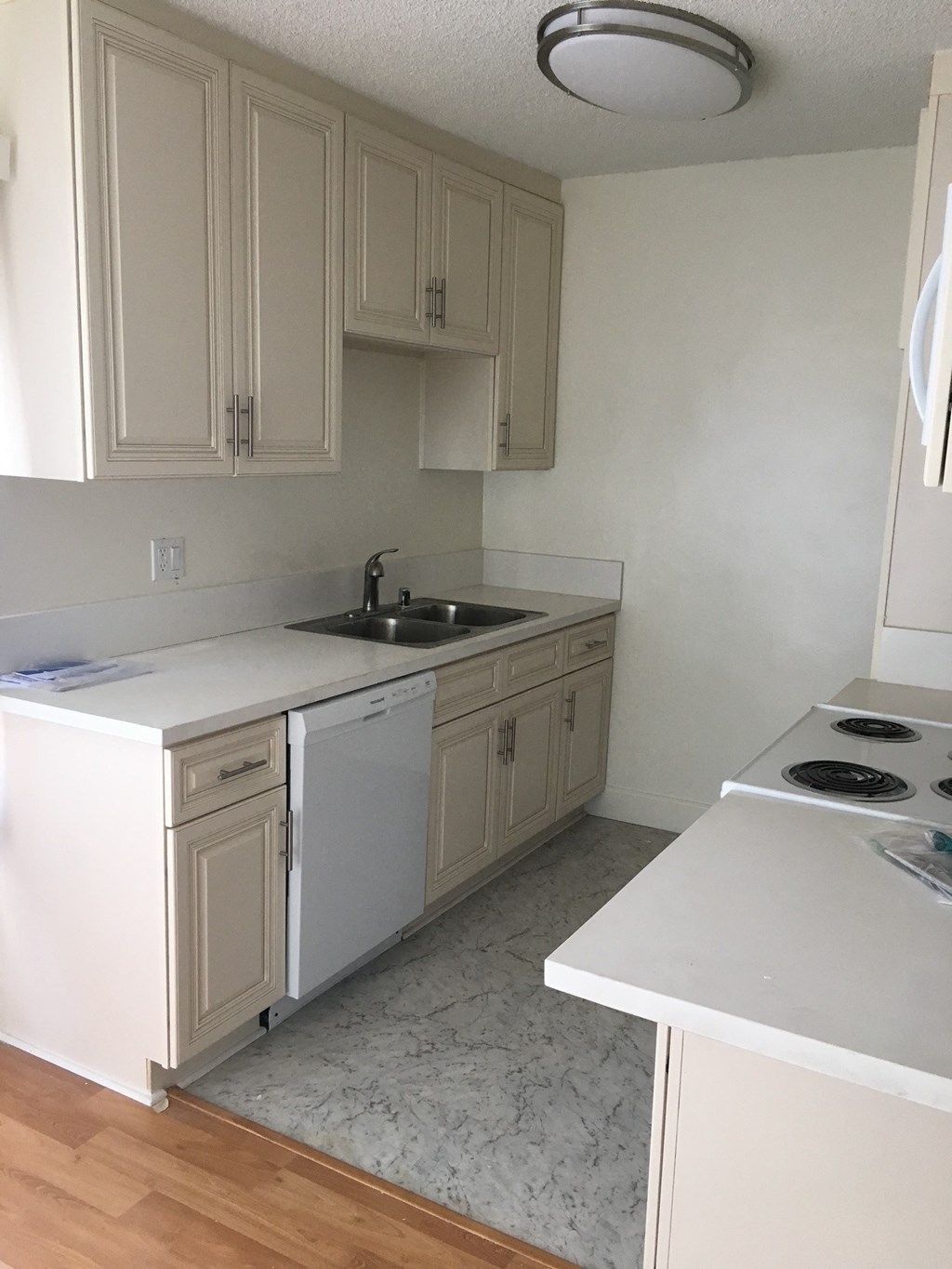 Kitchen with White Appliances and White Cabinets