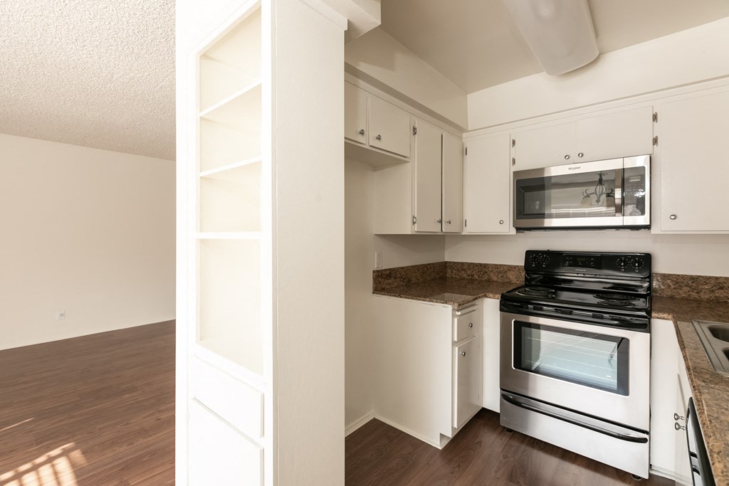 Kitchen with Stainless Steel Appliances and White Cabinets