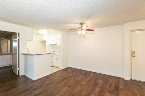 Dining Room with Hardwood Floors and Fan