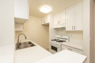 Kitchen with White Appliances and White Cabinets