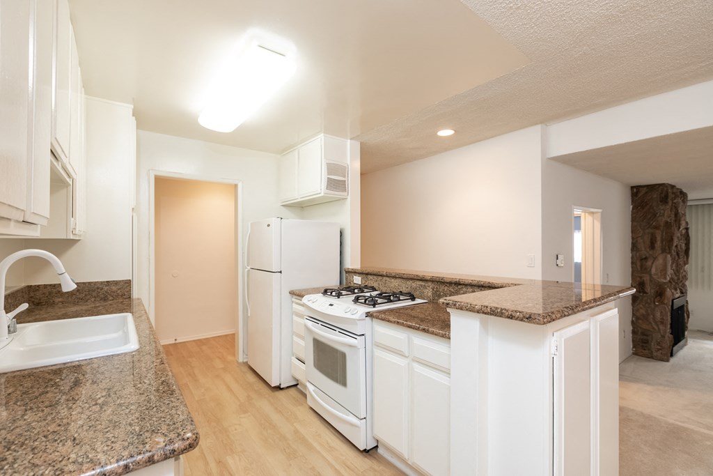 Kitchen with White Appliances and White Cabinets