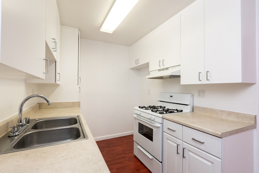 Kitchen with White Appliances and White Cabinets