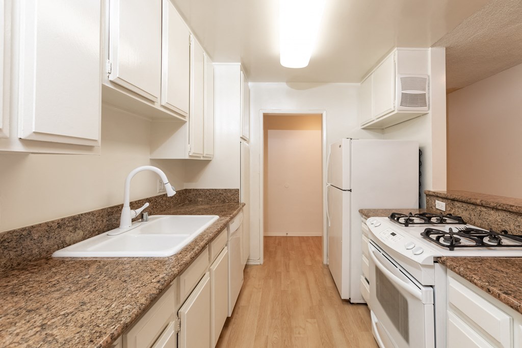 Kitchen with White Appliances and White Cabinets