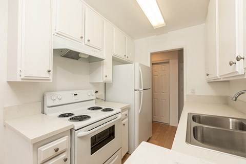 Kitchen with White Appliances and White Cabinets