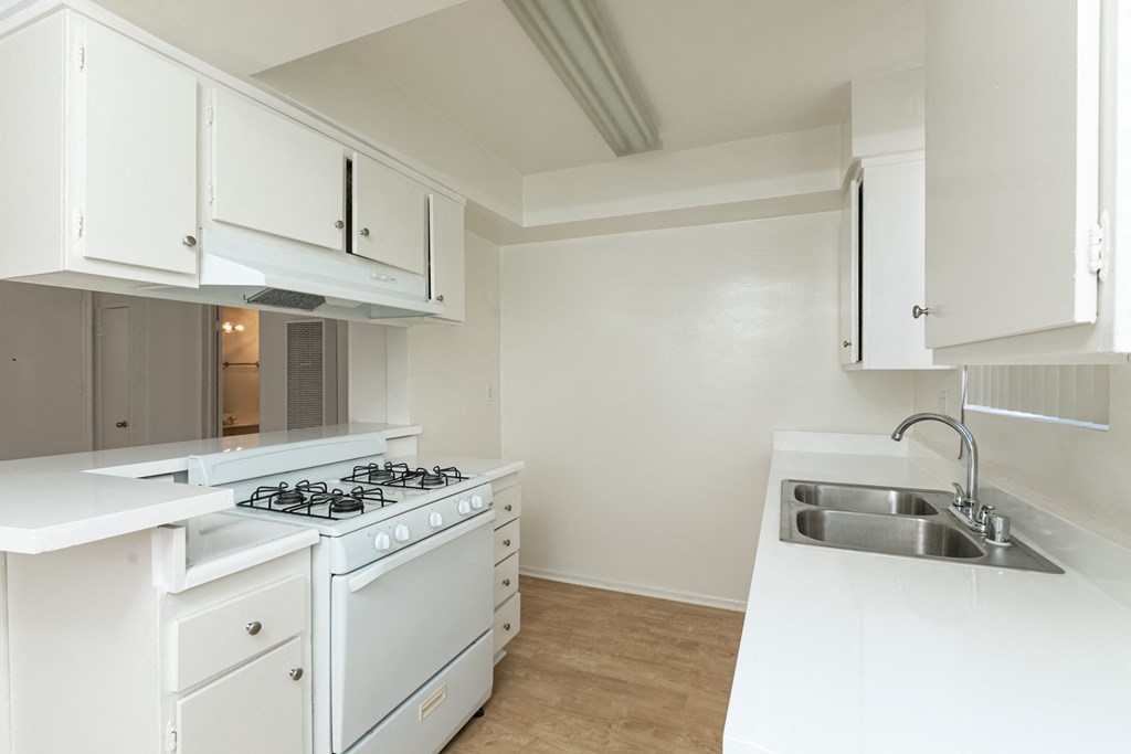 Kitchen with White Appliances and White Cabinets