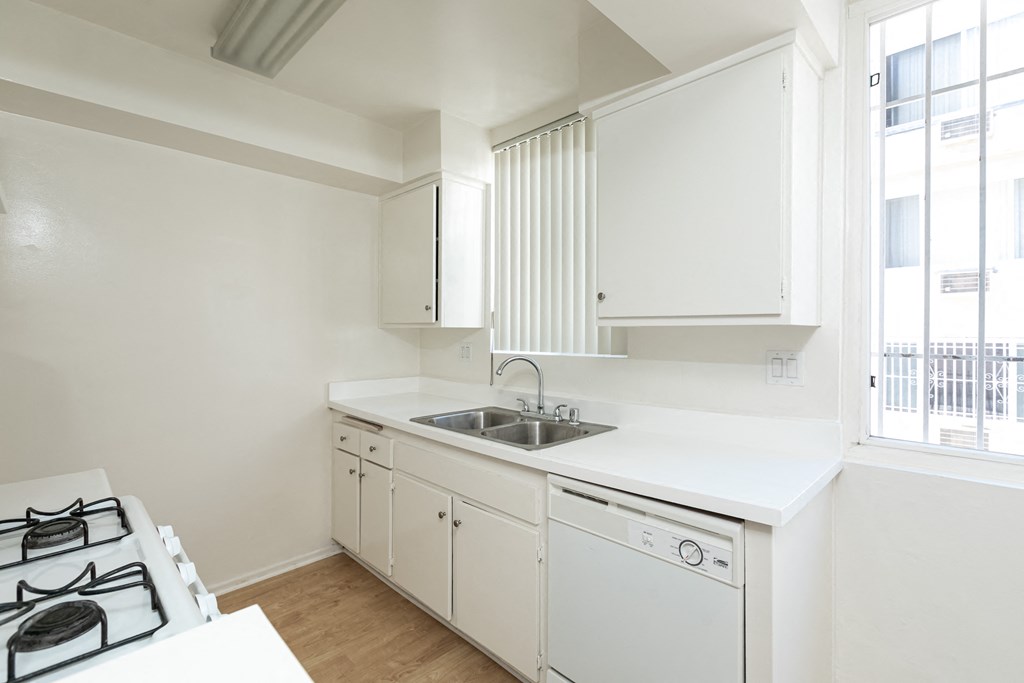 Kitchen with White Appliances and White Cabinets