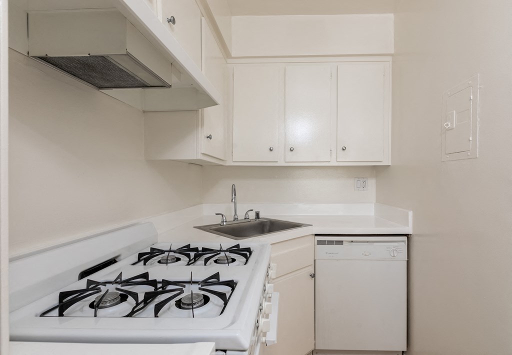 Kitchen with White Appliances and White Cabinets