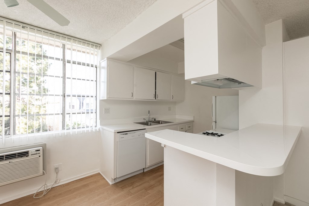Kitchen with White Appliances and White Cabinets