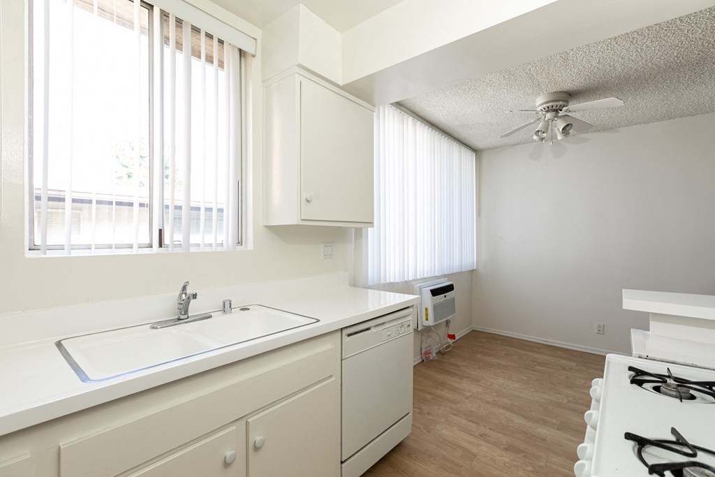 Kitchen with White Appliances and White Cabinets