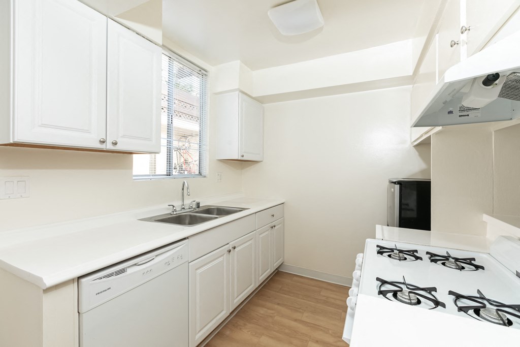Kitchen with White Appliances and White Cabinets