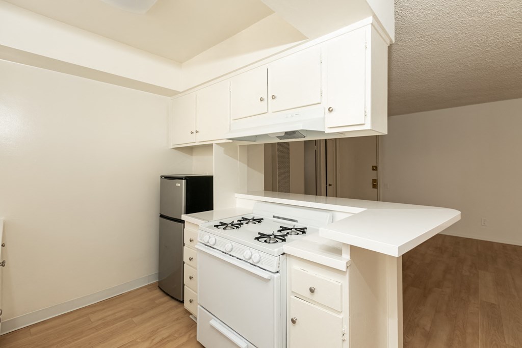 Kitchen with White Appliances and White Cabinets
