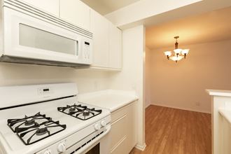 Kitchen with White Appliances and White Cabinets
