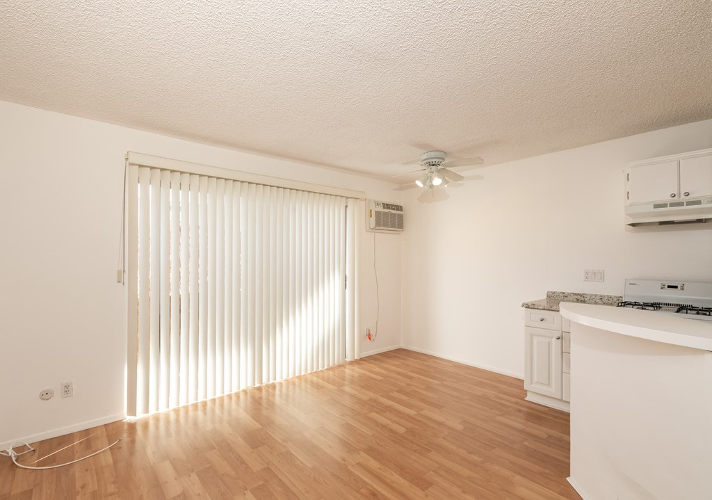 Living Room with Hardwood Floors and Patio Doors