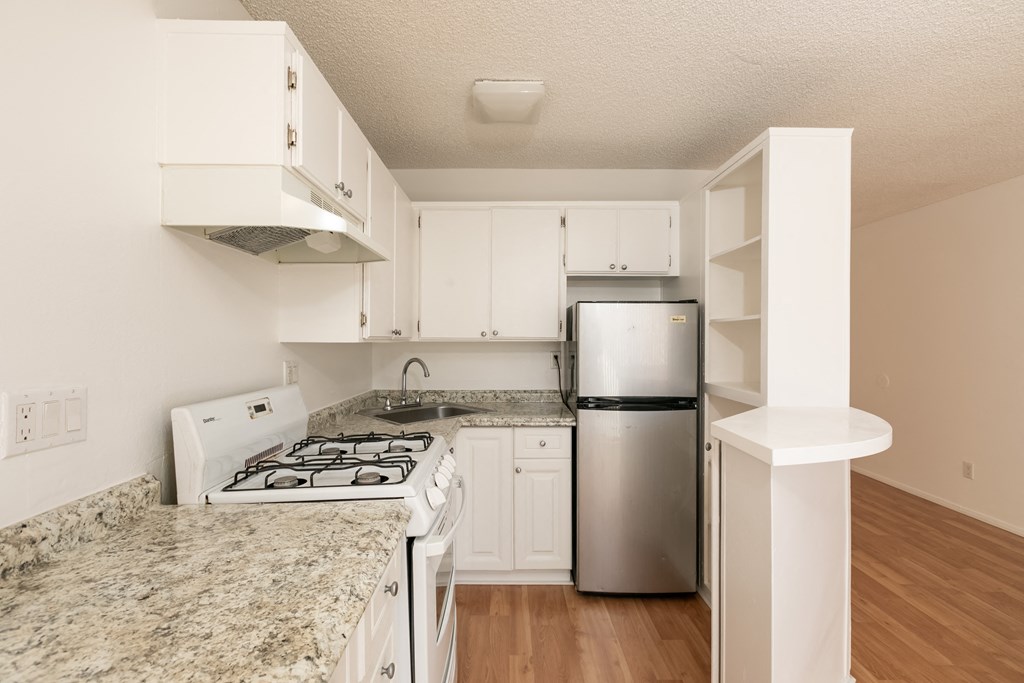 Kitchen with White Appliances and White Cabinets