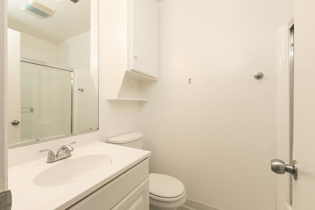 Bathroom with White Cabinets