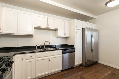 Kitchen with Stainless Steel Appliances and White Cabinets