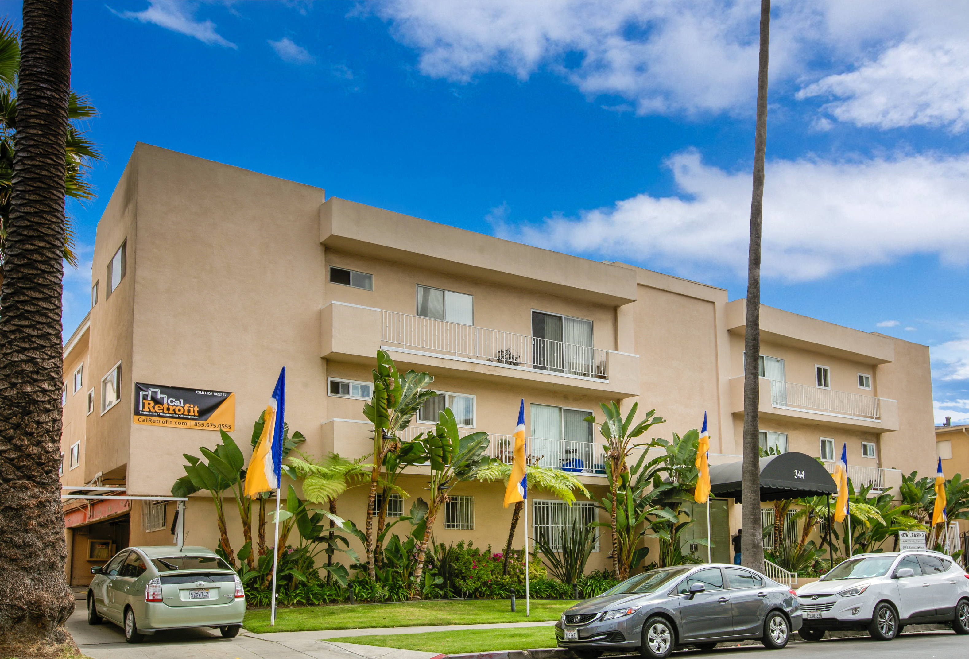 a building with cars parked in front of it