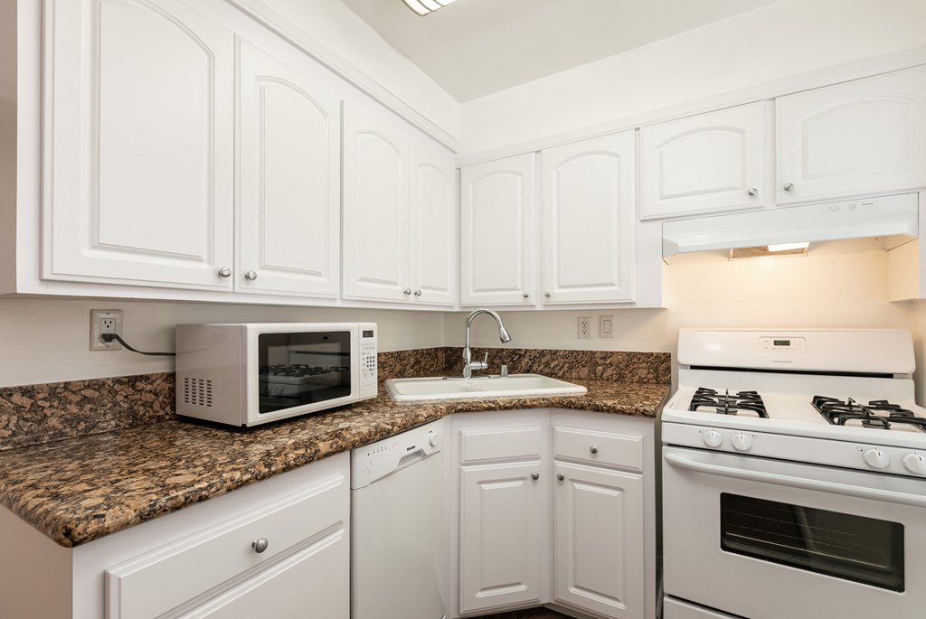Kitchen with White Appliances and White Cabinets