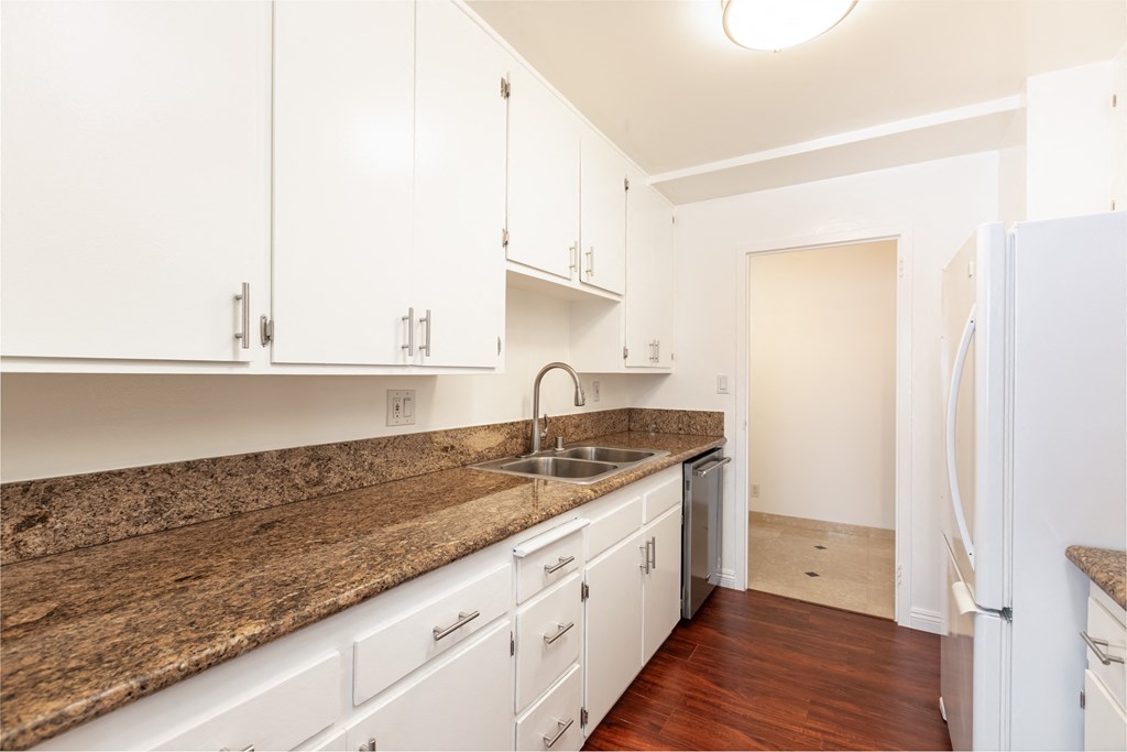 Kitchen with White Appliances and White Cabinets