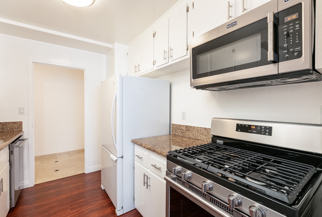Kitchen with Stainless Steel Appliances and White Cabinets