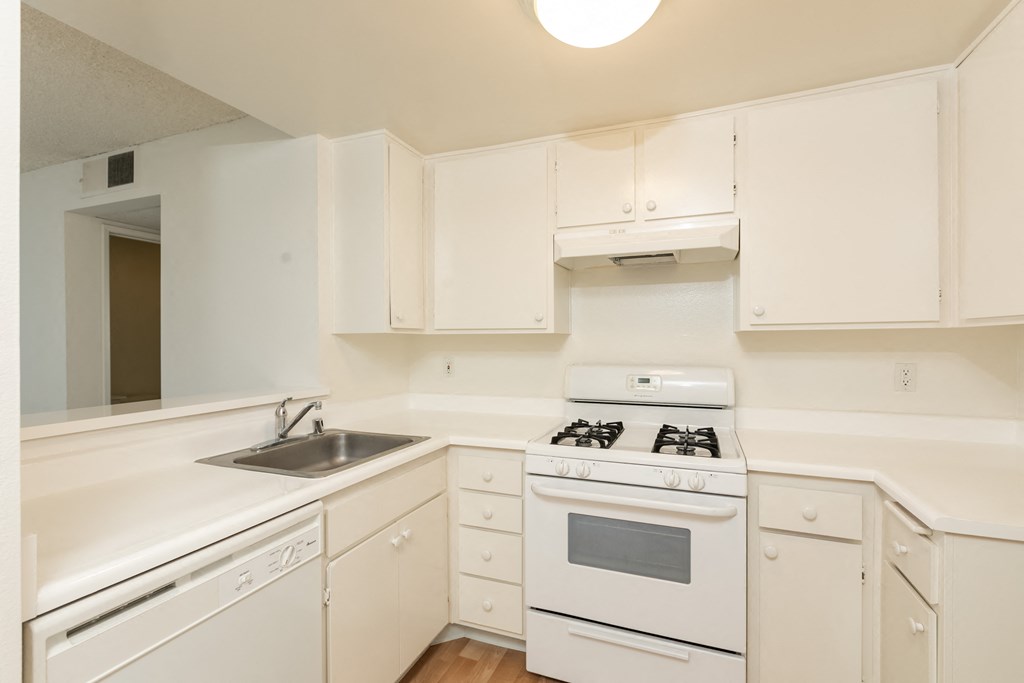 Kitchen with White Appliances and White Cabinets