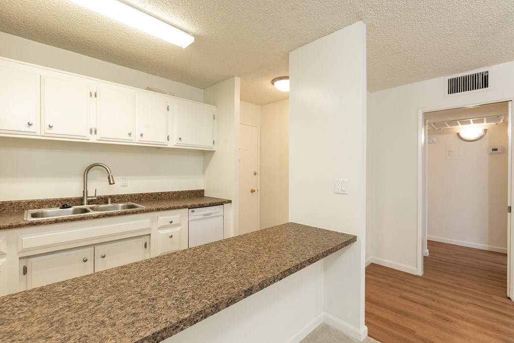 Kitchen with White Appliances and White Cabinets