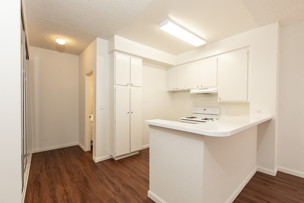 Kitchen with White Appliances and White Cabinets