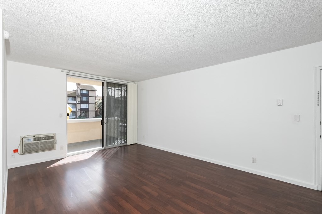 Living Room with Hardwood Floors and Patio Doors