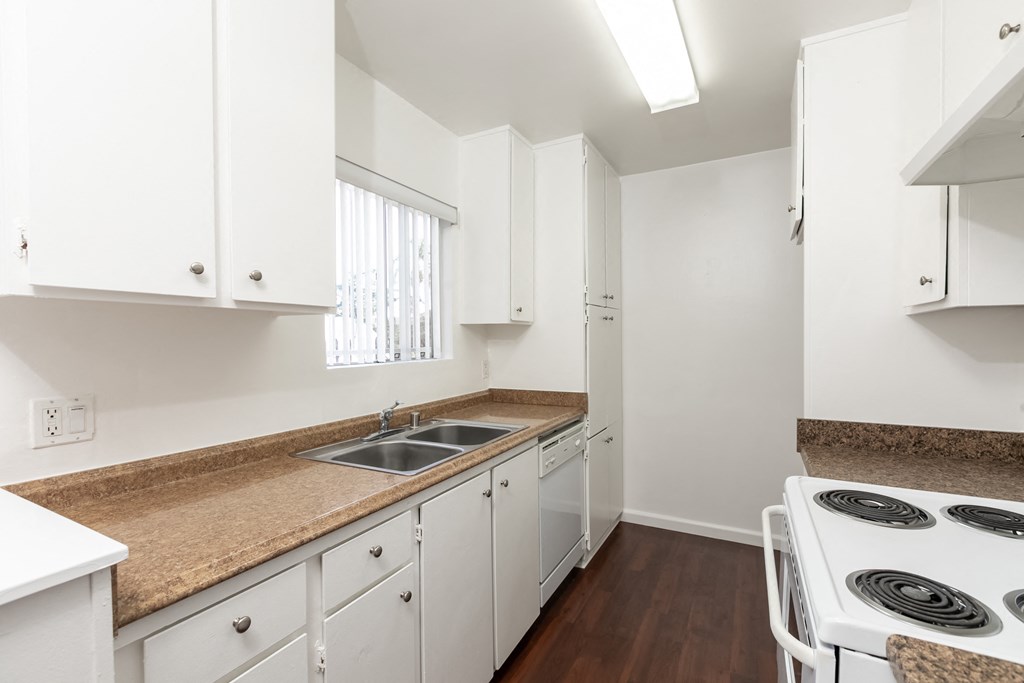 Kitchen with White Appliances and White Cabinets