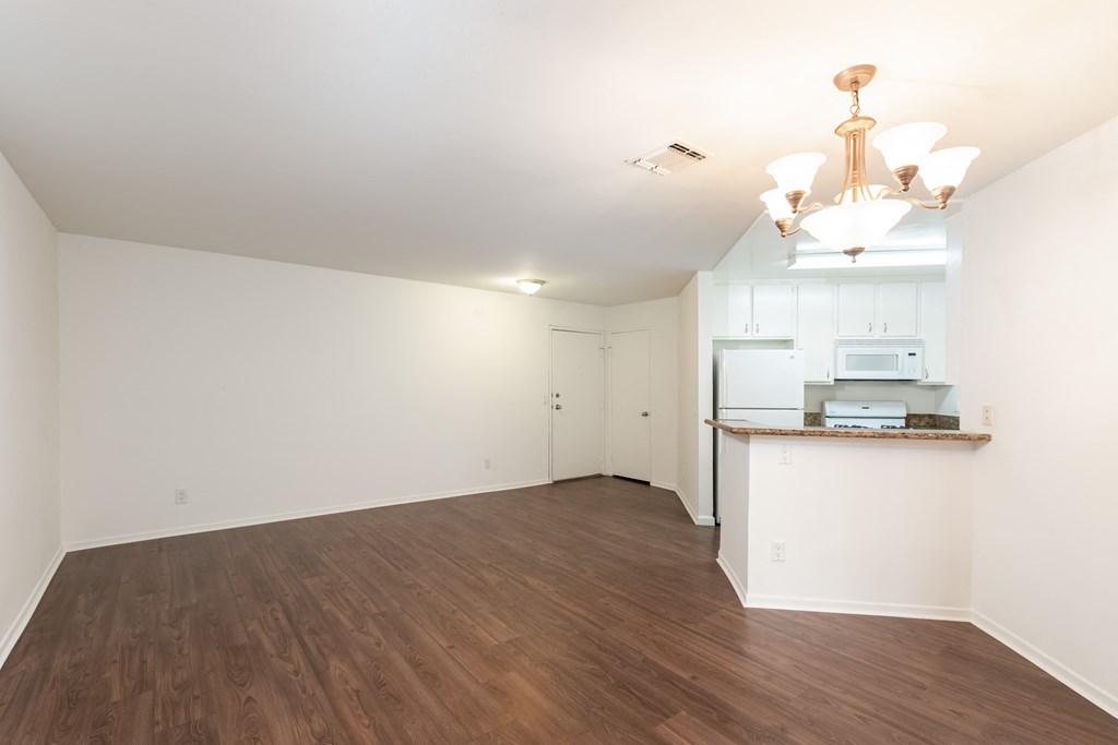 Dining Room with Hardwood Floors and Chandelier