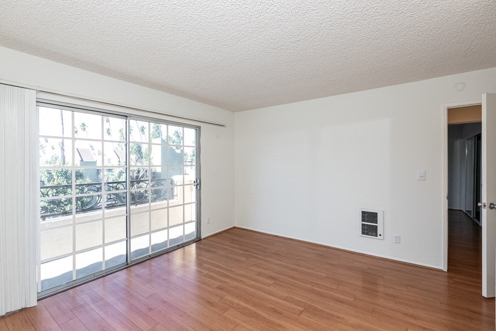 Living Room with Hardwood Floors and Patio Doors