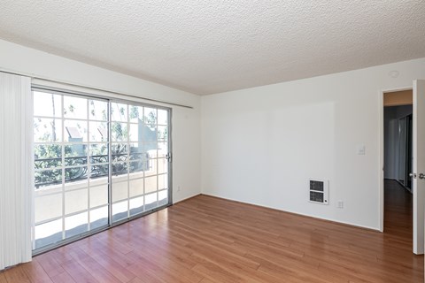 Living Room with Hardwood Floors and Patio Doors