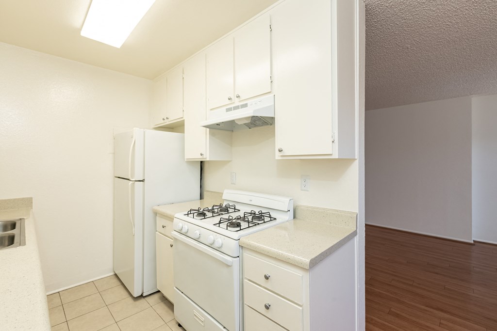 Kitchen with White Appliances and White Cabinets