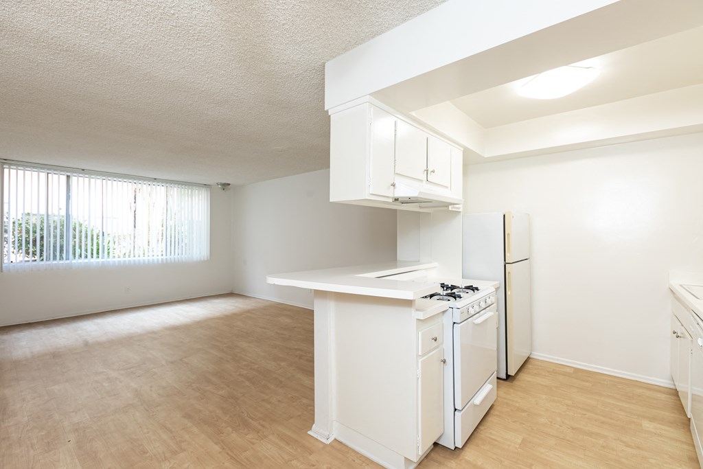Kitchen with White Appliances and White Cabinets