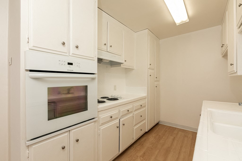 Kitchen with White Appliances and White Cabinets