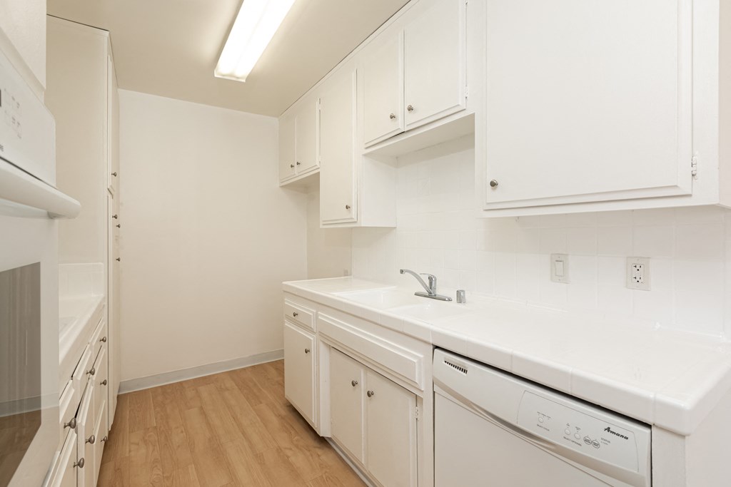 Kitchen with White Appliances and White Cabinets