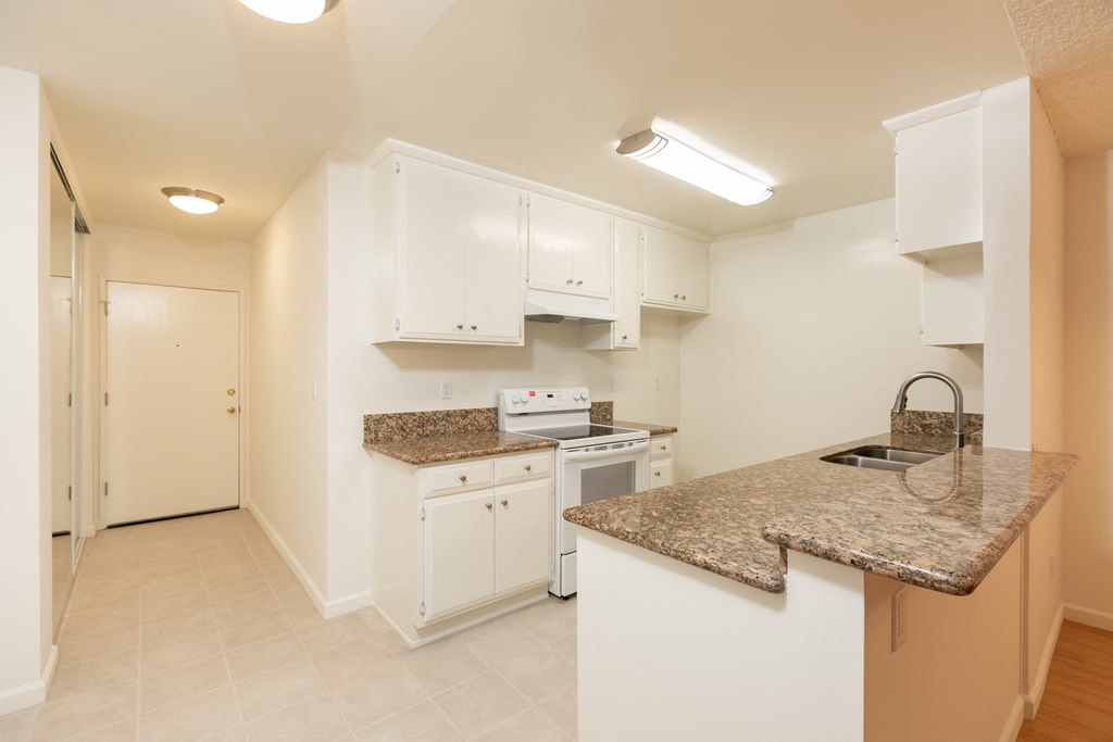 Kitchen with White Appliances and White Cabinets