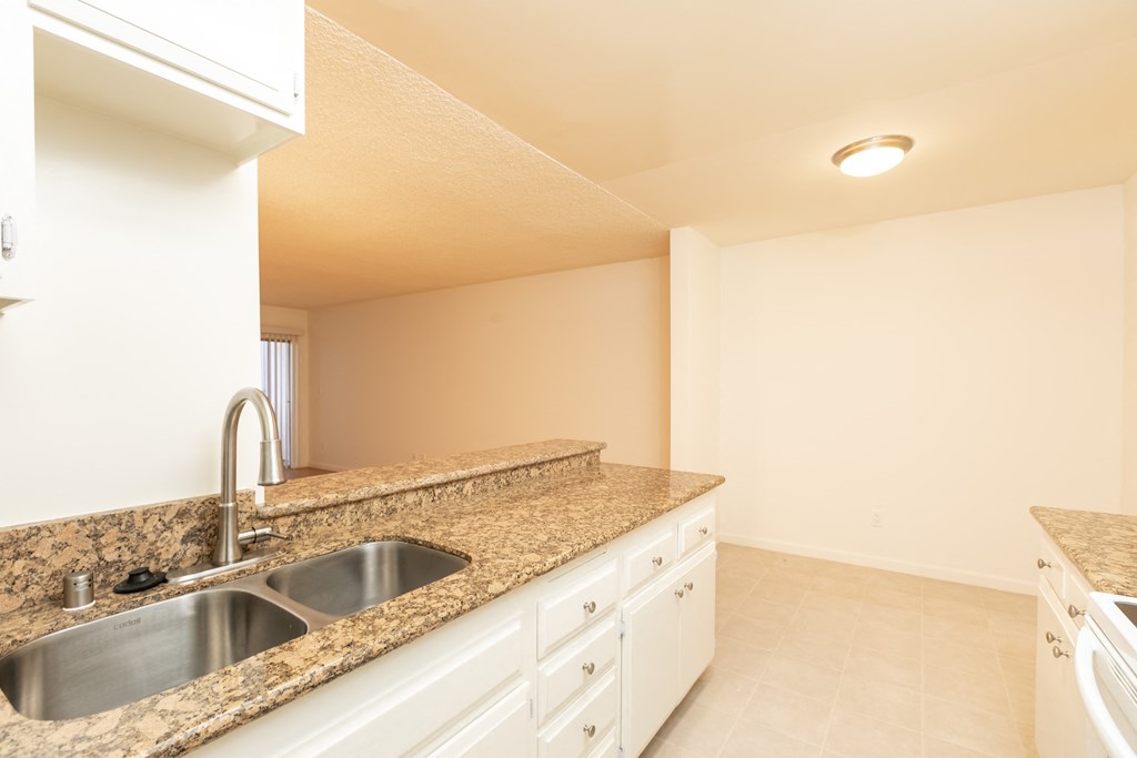 Kitchen with White Appliances and White Cabinets