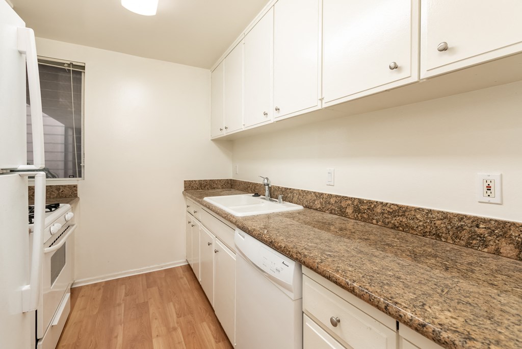 Kitchen with White Appliances and White Cabinets