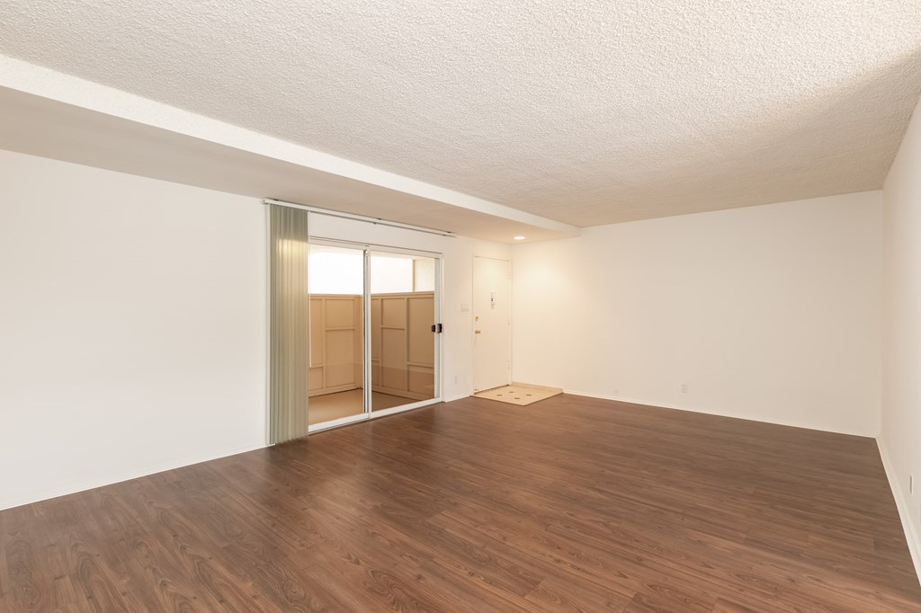 Living Room with Hardwood Floors and Patio Doors