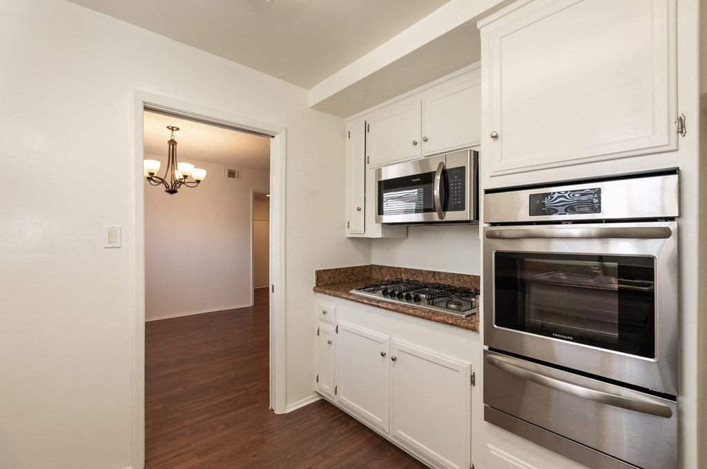 Kitchen with Stainless Steel Appliances and White Cabinets