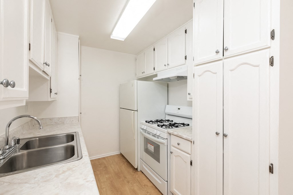 Kitchen with White Appliances and White Cabinets