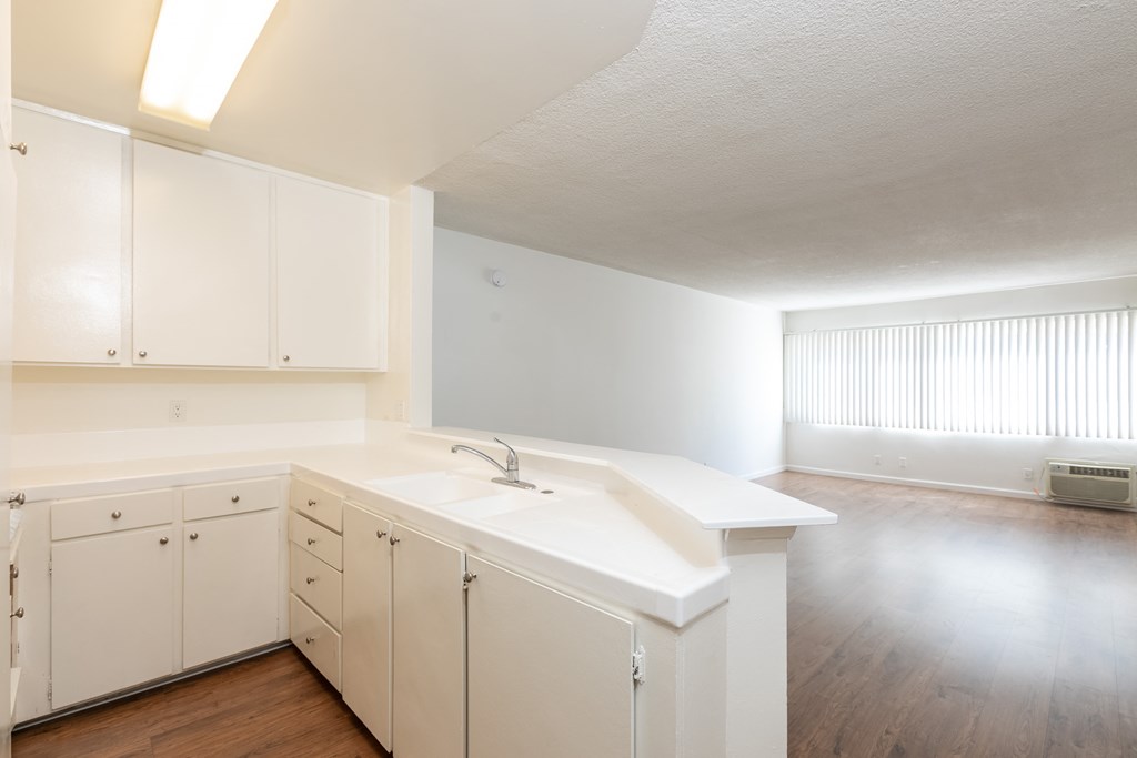 Kitchen with White Appliances and White Cabinets