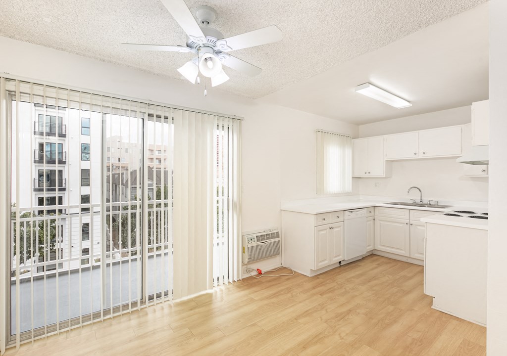 Dining Room with Hardwood Floors and Fan