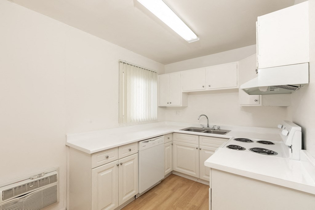 Kitchen with White Appliances and White Cabinets