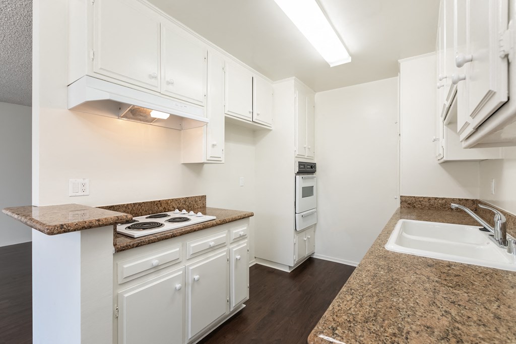 Kitchen with White Appliances and White Cabinets